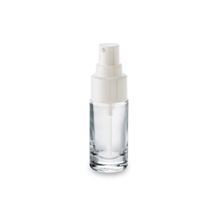 A nozzle pump on its Premium 30 ml glass cosmetic bottle
